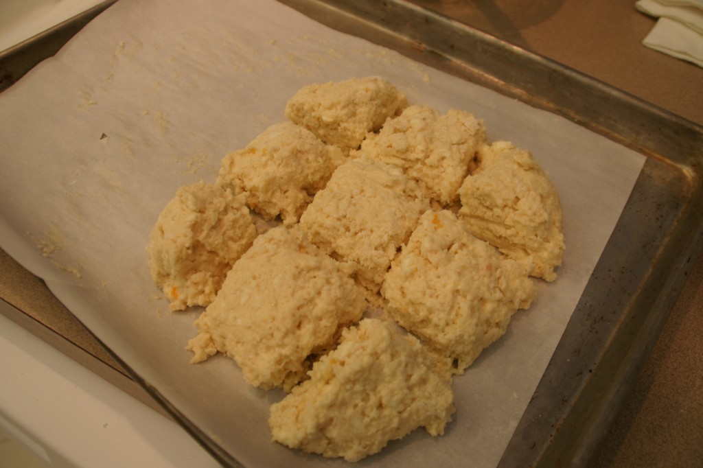 I cut the dough with a large knife and used the knife to slide the slightly dough apart.