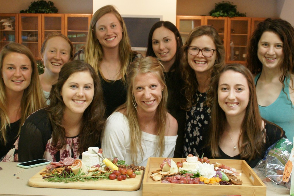 Hilary Austin, Samantha Kallman, Tessa Mauer, Shelby Jones, Andria Nyenhuis, Ciera Sebelius, Jordanna Pedersen, Sara Small, Abby DeWitt work out the plan for antipasto boards. 