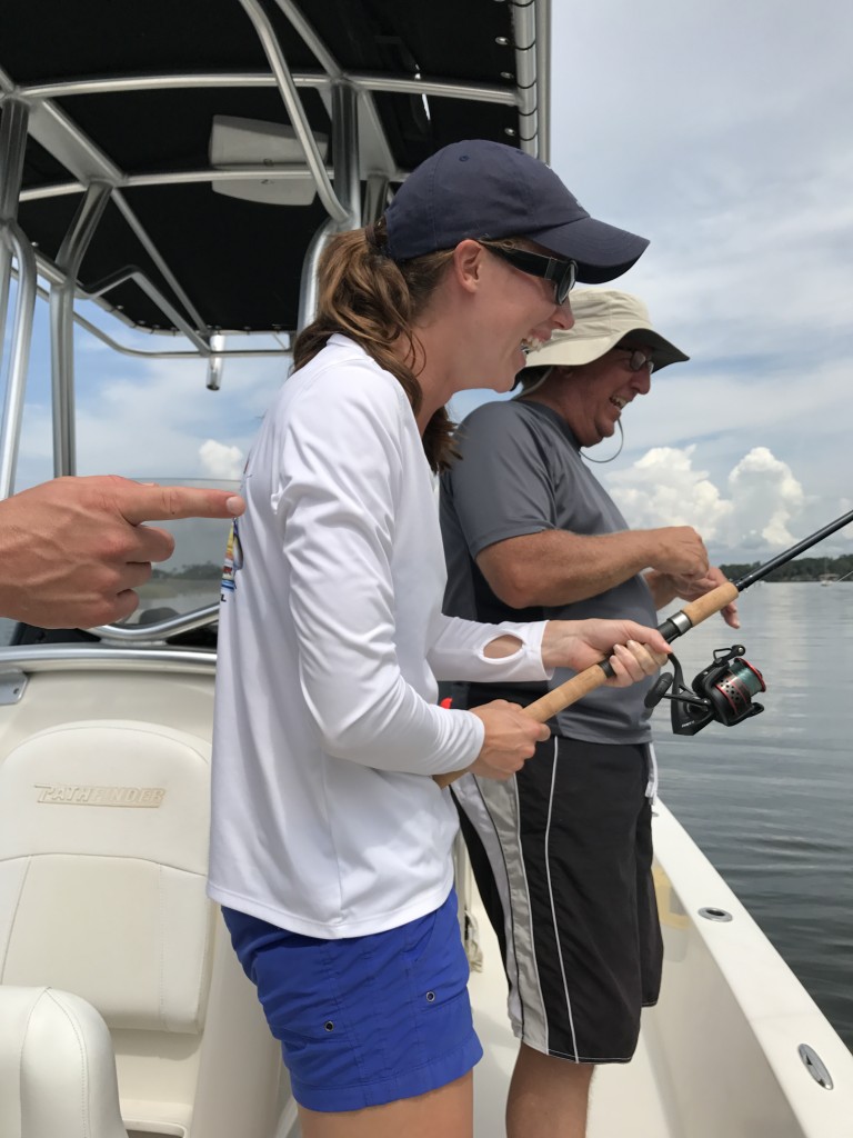 Ashley and Dave took over the fishing pole after Carson caught a sting ray, but they are at a loss of what to do with it.