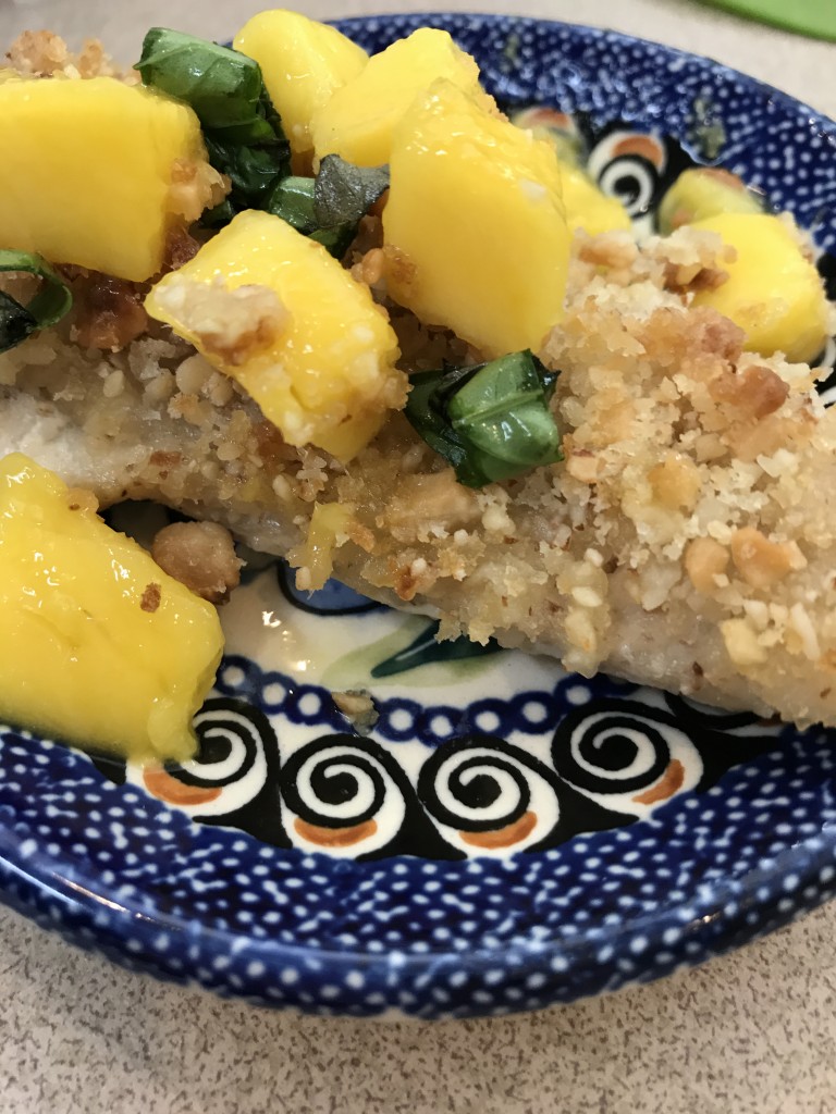 A Mango Salsa with just a touch of citrus balances the saltiness of the macadamia crusted fish. 