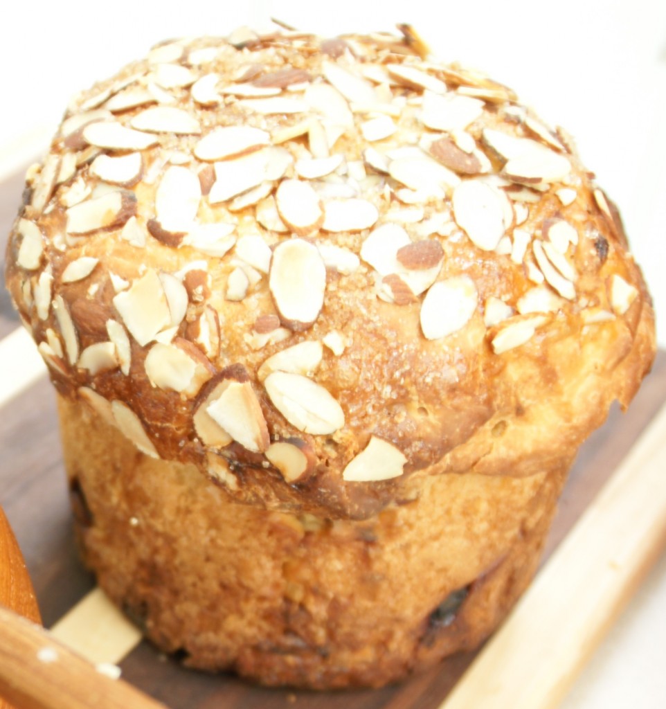 The can contains the shape until the dough rises above the rim and then the dough can bloom into the beautiful. traditional Panettone shape.