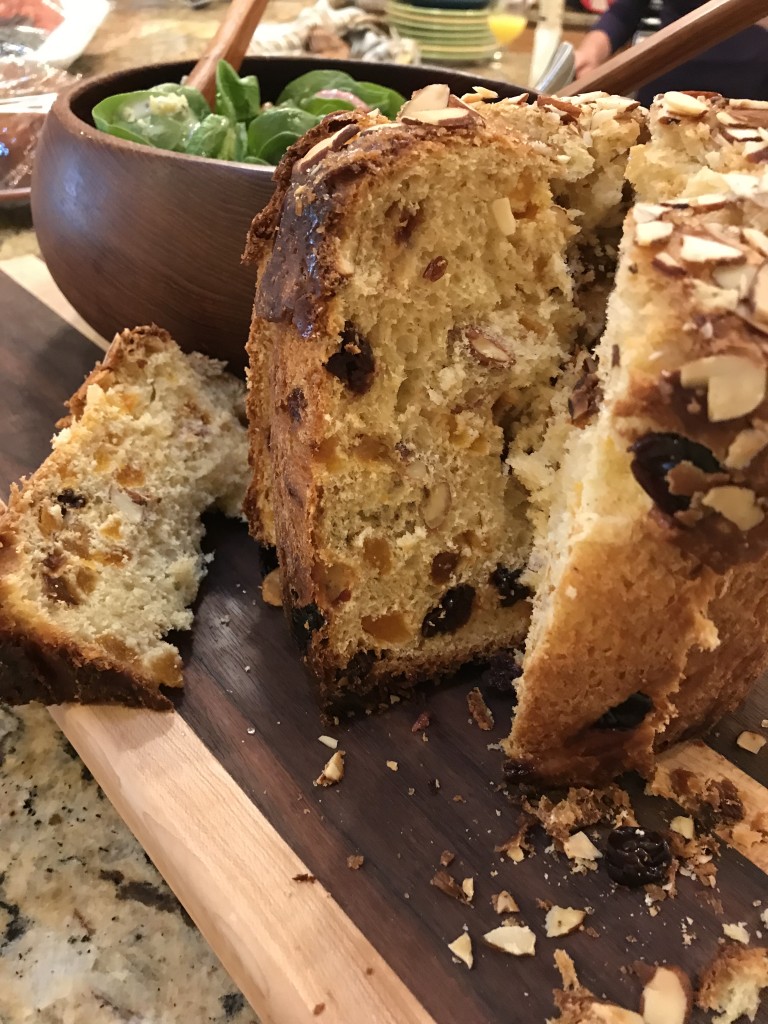 Dried apricots, pineapple,  craisins and almonds are secretly hidden in the center of each panettone, making for a delicious surprise when it is sliced. 