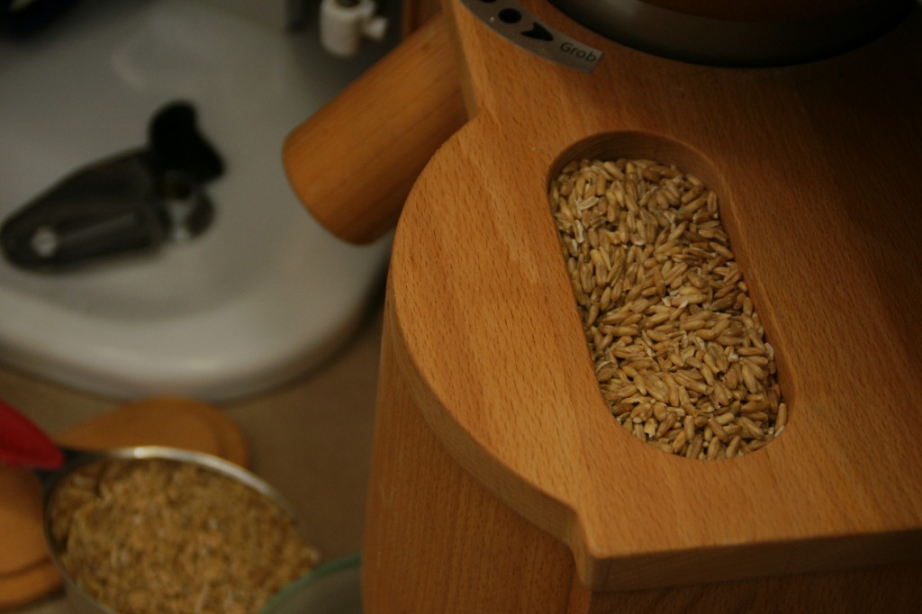 The whole spelt goes into the top of the hopper and can be ground into coarse or fine flour.